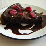 Chocolate Cake with Chocolate Topping along Red Barrie