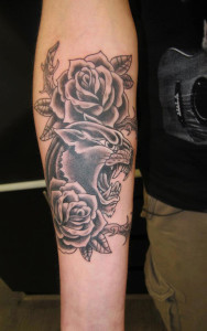 Black Rose Tattoo on Arm