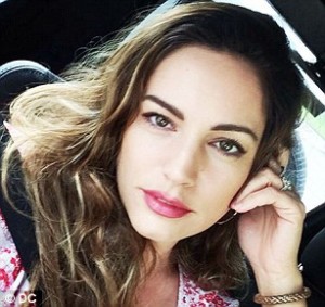 Kelly Brook takes a quick selfie