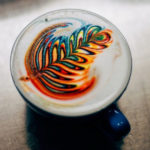 beautiful coloured fancy coffee latte art