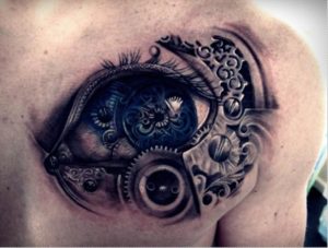 Beautiful Mechanical Black Eye Tattoo on Left Chest