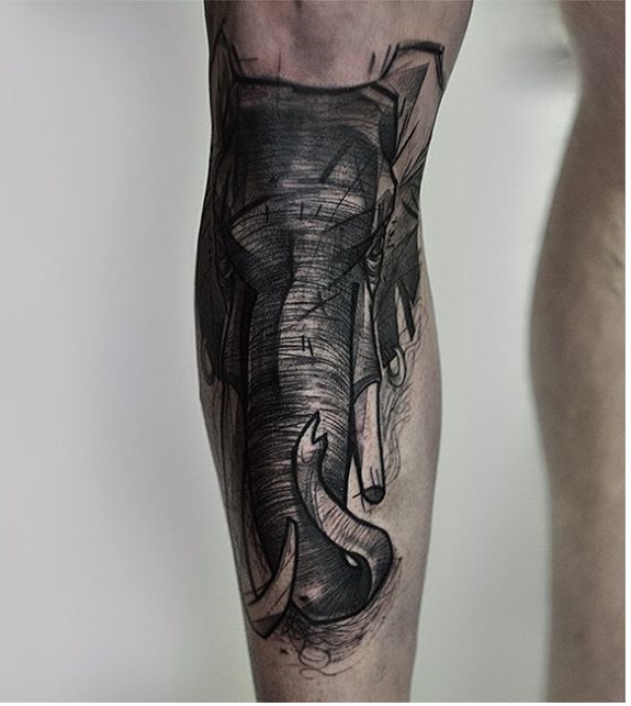 black sketch elephant tattoo on foot