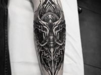 blackwork elephant skull tattoo on the leg