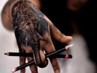 elephant hand tattoo