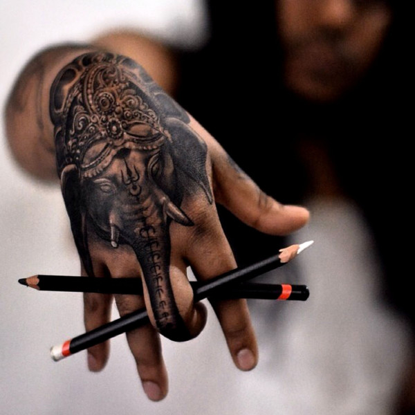 elephant hand tattoo