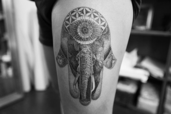 elephant henna tattoo on the hip